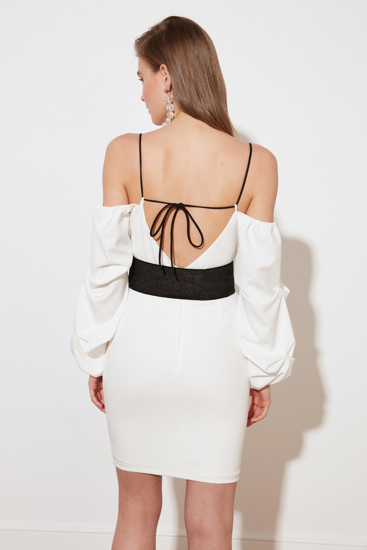 White dress with black velvet belt