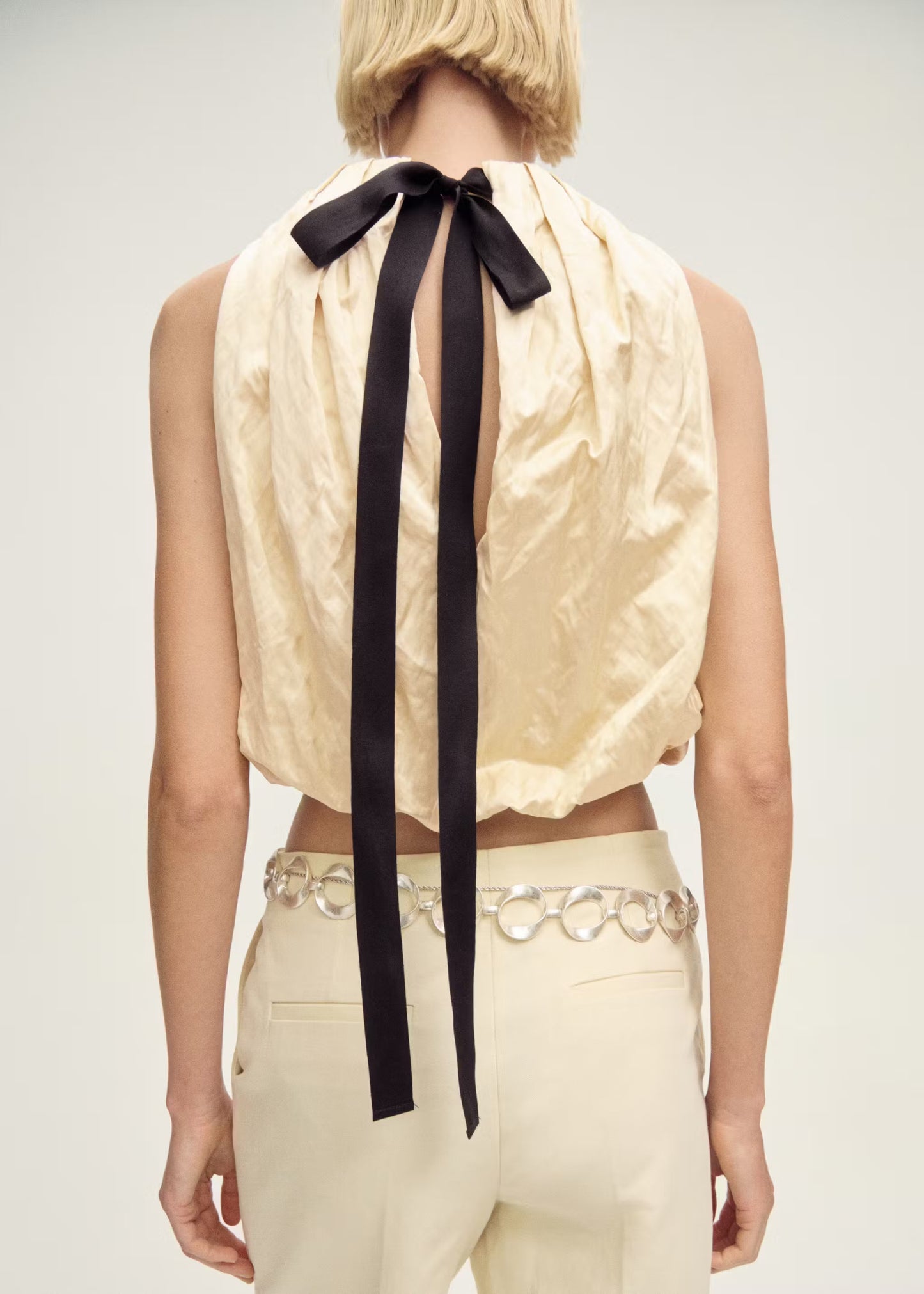 Capsule pleated volume sleeve top